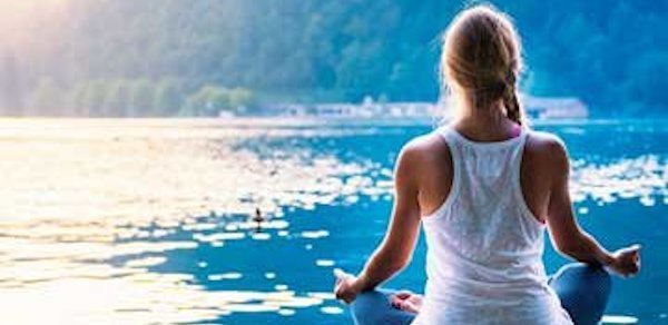 meditation-class-melbourne-kate-james woman meditating by a lake